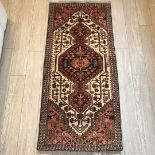 A hand-made Shiraz Rug, geometric design,