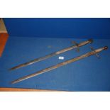 Two Toledo Spanish dress swords.