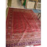 A red ground Bokhara Carpet, 2.3 x 1.