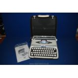 A Smiths Corona Zephyr portable Typewriter.