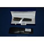 A Waterman two-pen set ( a fountain pen and ball-point pen) with leather case and original box.