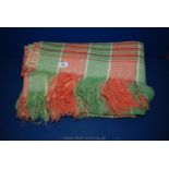 A Welsh Blanket in green and orange check