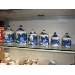 Six graduated lidded Pots in blue and white
