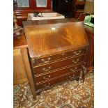 A contemporary Mahogany Bureau,