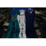 A green and gold coloured evening dress together with a Kati size 12 lace and blue long dress and