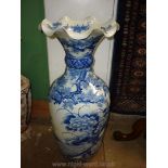 An oriental blue and white Floor Vase with crimped top,