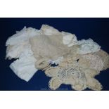 A ladies 1920's dress belt and crochet items, table mats, etc.