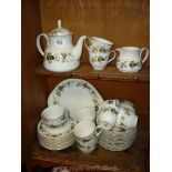 A Royal Worcester 'Larchmont' Teaset comprising eleven cups, twelve saucers, teapot, milk jug,