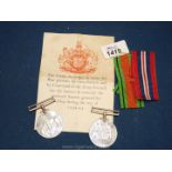 World War II medals and braids (Defence Medal & 1939/1945 Medal) to Mr. C.