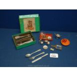 A small box of miniature cutlery, tea set, egg timer, tray, mirror, etc.