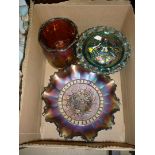 Three pieces of carnival glass.