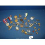 A quantity of military items including WWII medals including Atlantic Star, briads,