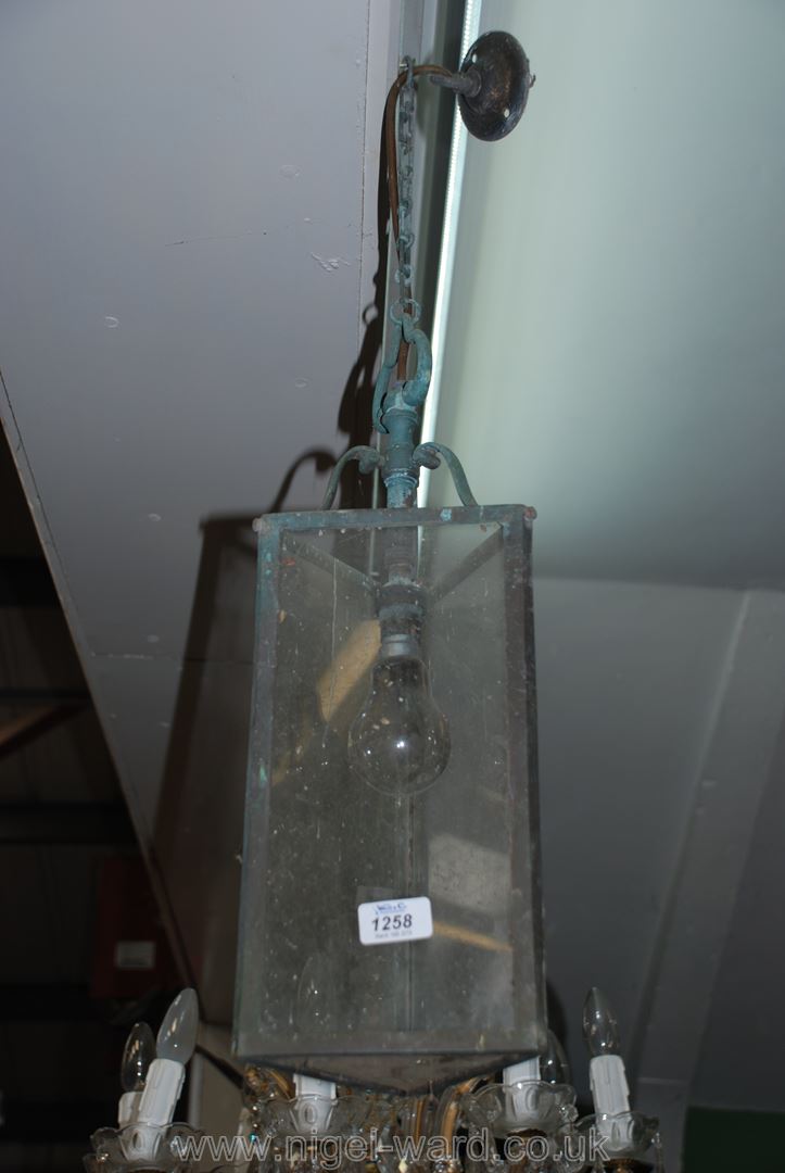 A triangular shaped Brass framed and glazed Hall Lantern,