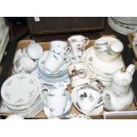 A white ground part Teaset decorated with swallows comprising bread & butter plate,