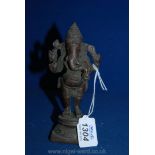 A brass elephant God figure.