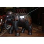 A large wooden elephant.