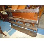 An antique dark Oak Welsh dresser Plate Rack having fretworked frieze,
