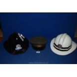 An Italian Fire Brigade peaked Cap with badge,