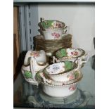 A part Coalport tea set, floral with green and gold decoration to include; cups, saucers, plates,
