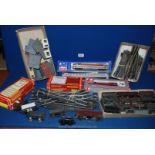 A 00 gauge model railway, including two boxed engines, sixteen wagons, trackwork and points,