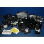 A large quantity of SLR film Cameras to include; Minolta, Nikon, Canon, etc.