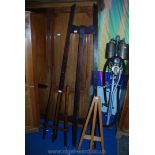 A large Victorian pine Easel dated 1887, and two smaller easels.