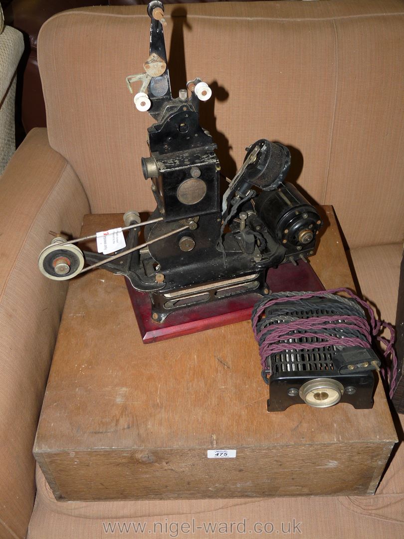 A Pathescope 95mm vintage 'Baby' Cine Projector and accessiories and manual, etc.