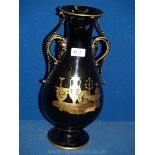 A black Burslem vase by Enoch Wood, decorated with urns and candlesticks in gold colour,