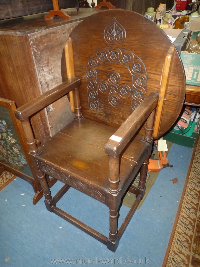 An older reproduction Oak Monk's Seat, the top 27" diameter approx.