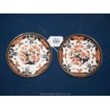 A pair of 19th c. Derby porcelain saucers hand-painted in pattern, no.