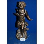 A cast Cherub figure.