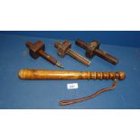 A wooden truncheon and three wooden mortice gauges