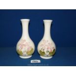 A pair of Moorcroft vases, 6 1/2" tall,
