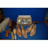 A quantity of wooden shoe lasts, clothes brushes, mincer, etc.