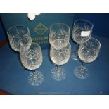 A boxed set of Bohemia crystal wine glasses (three white,