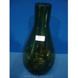 A tall green glass teardrop shape Vase with dimple decoration, 15 1/4" tall.