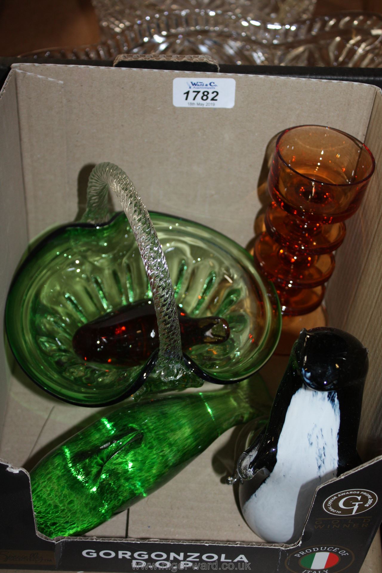 A quantity of Wedgwood glass including Candlestick Sheringham Amber, amber bird, Dolphin and Otter,