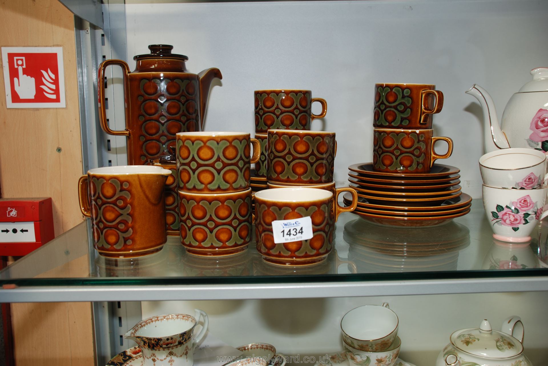 A Hornsea Bronte coffee set including coffee pot, nine cups and saucers, six plates,