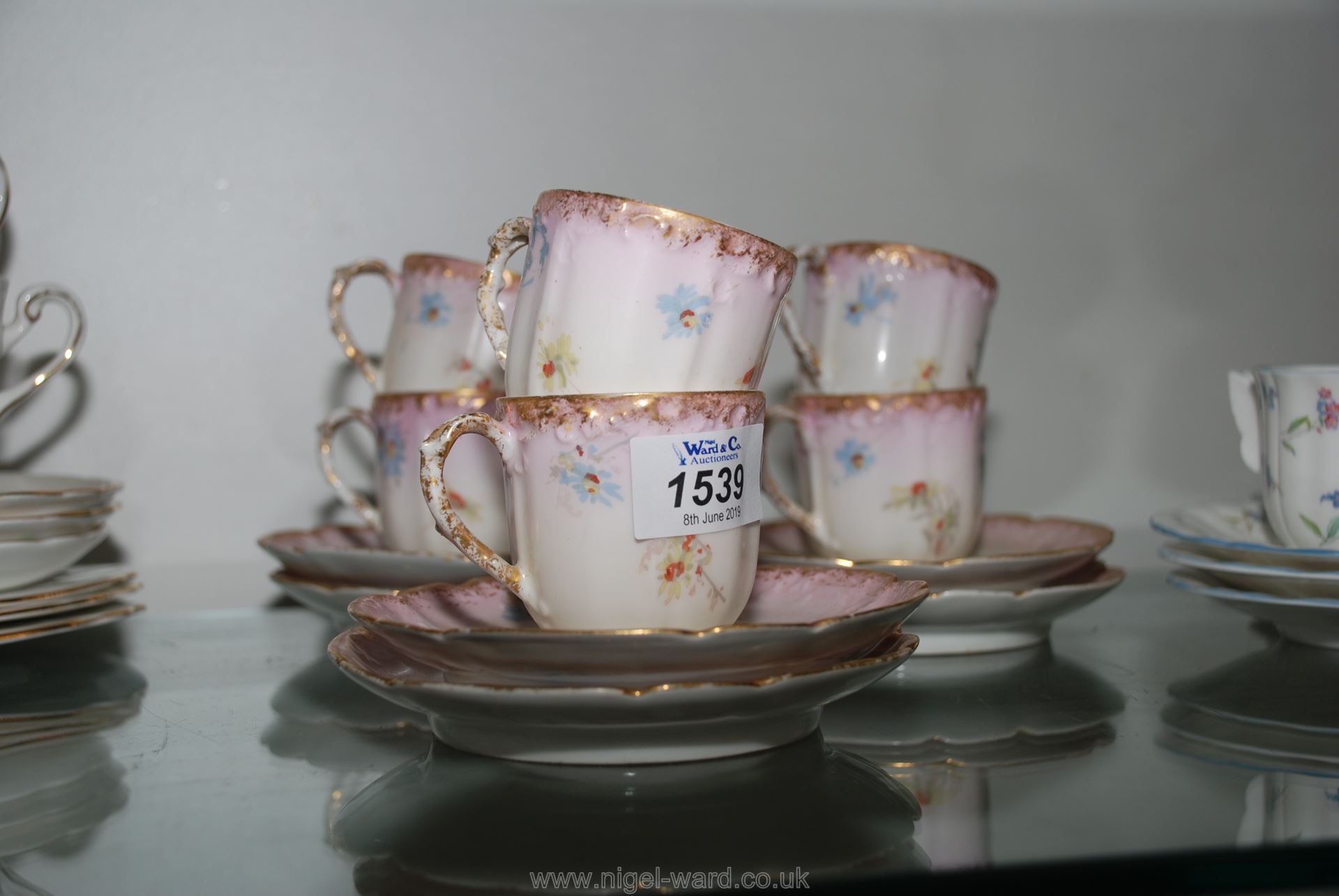 A Limoges coffee set, six cups and saucers.