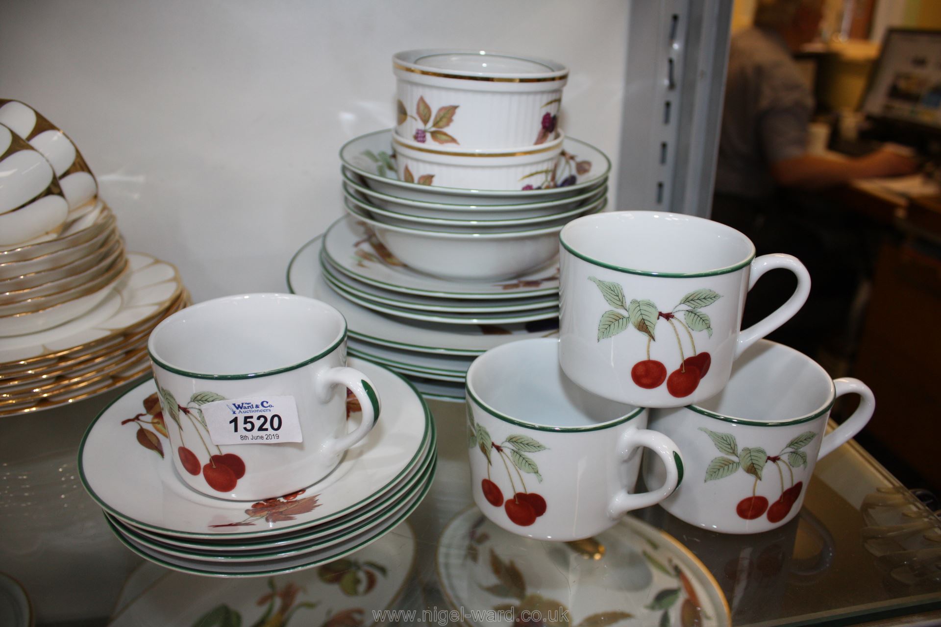 A Royal Worcester 'Evesham Vale' Dinner service comprising four dinner plates,