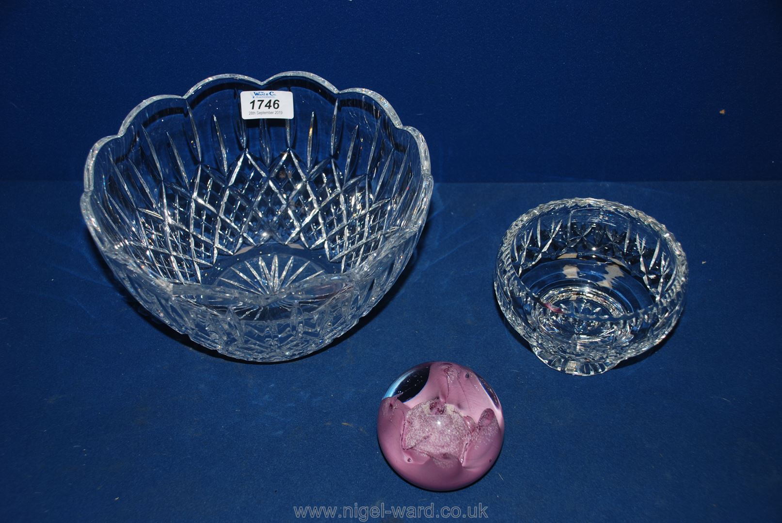 A large glass fruit bowl along with a small bowl by Thomas Webb and a Caithness Strawberry Fayre