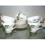 A Teaset with Lily of The Valley design to include six cups, six saucers and six plates.