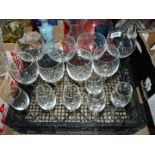 A quantity of crystal glasses including four swirl wine glasses,