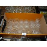 A box of cut glass glasses including wine and whisky, sherry and tots.