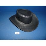 A black leather Australian style brimmed hat with plaited leather band, size M.