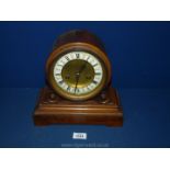A Mahogany and Satinwood mantel Clock,