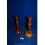 A pair of fruitwood Candlesticks.