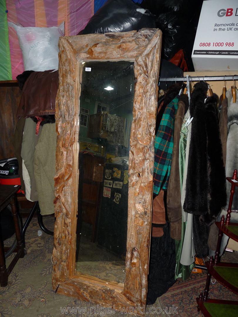 A rustic driftwood framed rectangular Mirror, 71" x 27 1/2" overall.