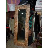 A rustic driftwood framed rectangular Mirror, 71" x 27 1/2" overall.