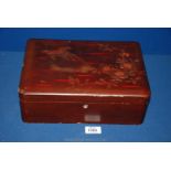 A red lacquered Chinese box.